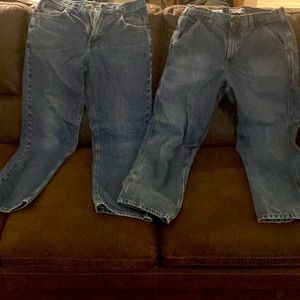 Two pairs of Carhartt jeans 32 34